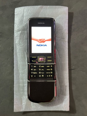 Nokia 8800 Arte Sapphire like new collectible brown with charging base