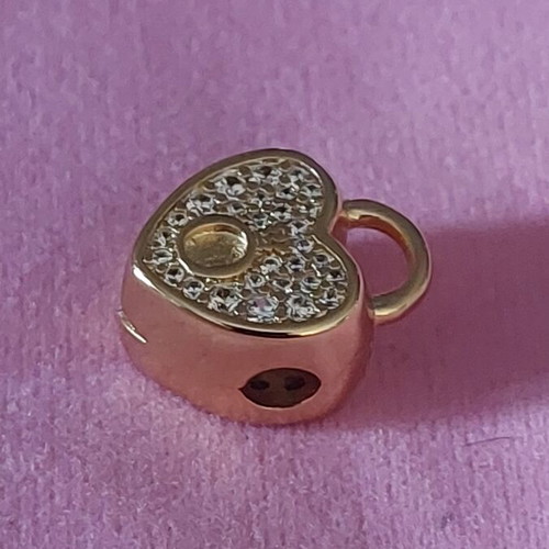 Charm stopper heart new, gold color with white zirconia and Pandora logo