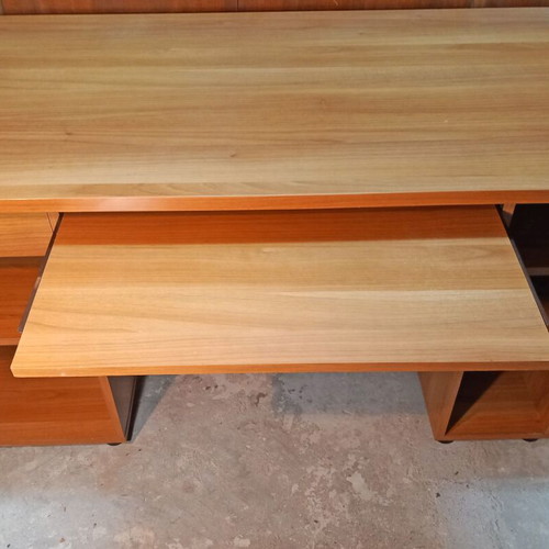 Desk like new with sliding shelf and computer space, cherry color