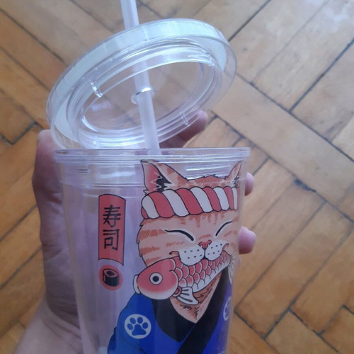 Cup with straw used, double wall for coffee and juices