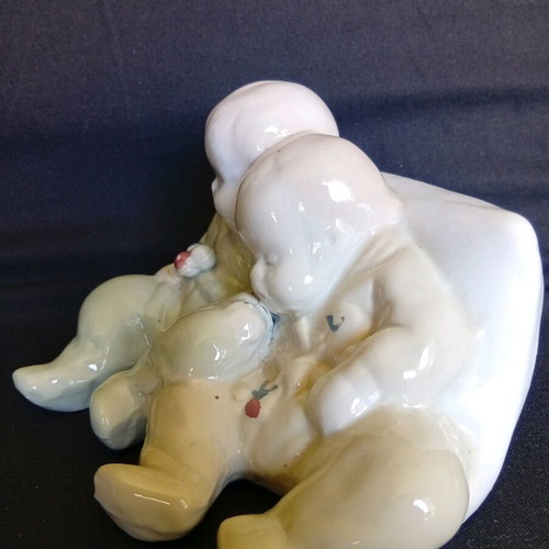 Porcelain figurine of twin babies like new