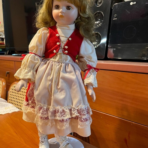 Vintage porcelain doll like new