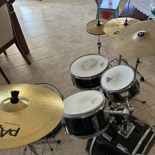 Millenium drum set used with Remo Emperor Coated heads and cymbals
