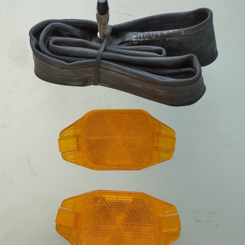 Bicycle accessory set used with lock, light, bell, reflectors, and inner tube