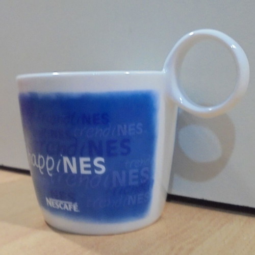 Nescafe Happines promotional porcelain mug used