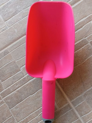 Plastic pink garden scoop like new