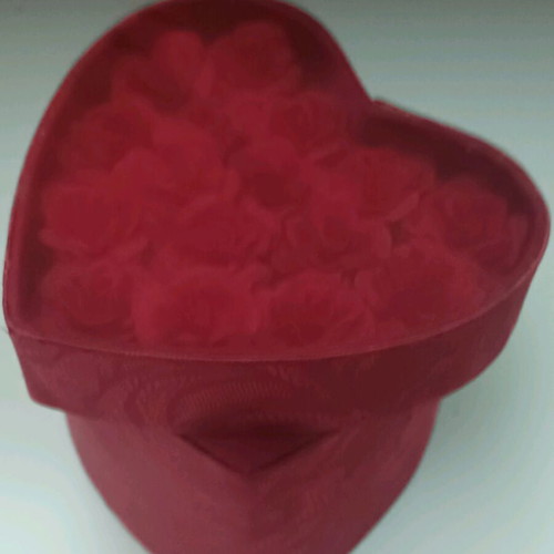 Heart-shaped box like new with roses