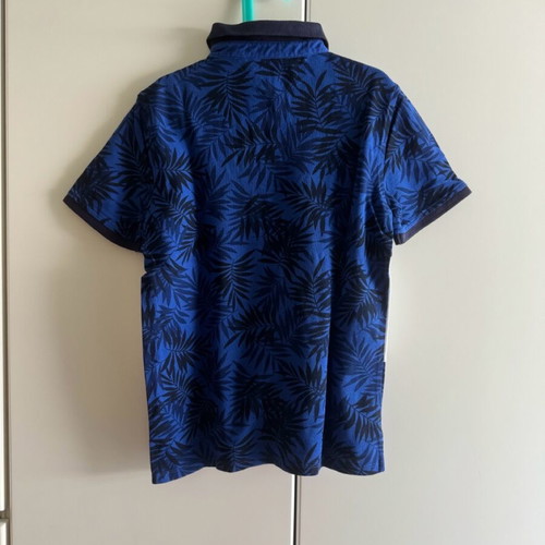 Polo μπλούζα Tommy Hilfiger για αγόρι Large 12-14 ετών σαν καινούργια, άσπρη και μπλε