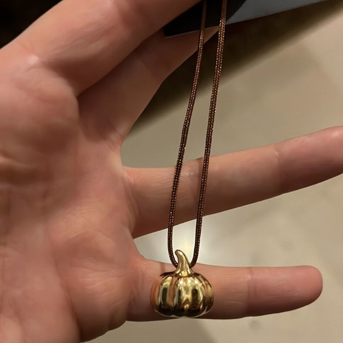 Pumpkin Treasure necklace new, gold color