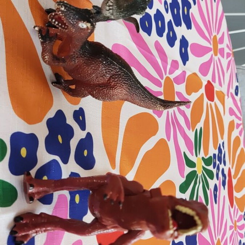 Plastic dinosaur toys used, all together