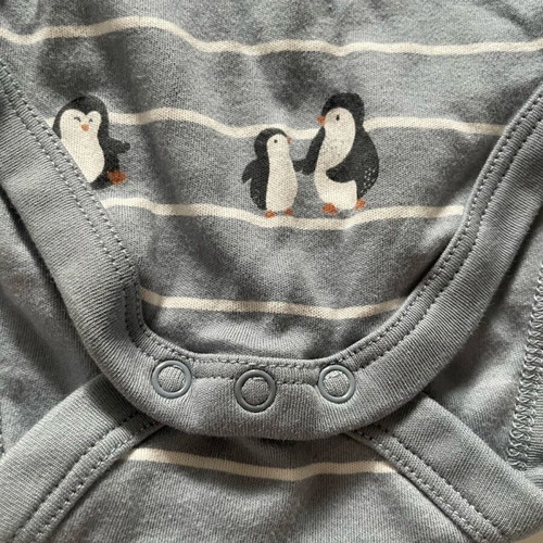 Baby bodysuit new with penguin design for newborns
