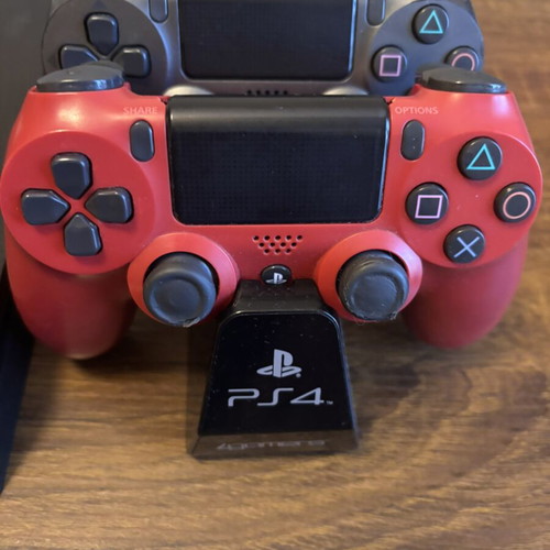 Sony PlayStation 4 Slim 500GB console with controllers
