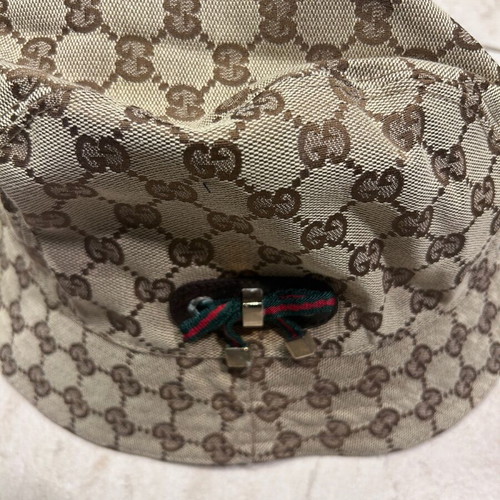 Gucci hat like new with metal details and brown lining