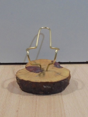 Metal decorative pipe stand with wooden base used
