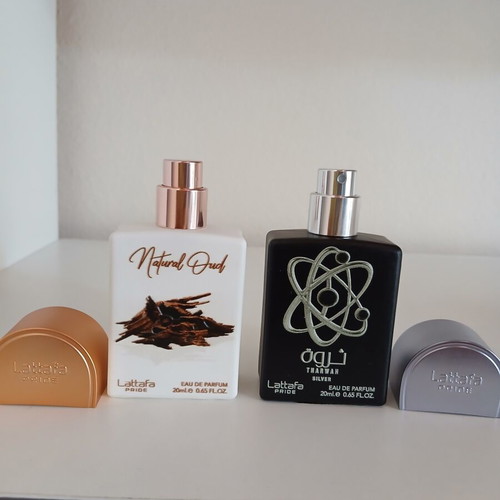 Lattafa Natural Oud and Tharwan Silver perfume set like new