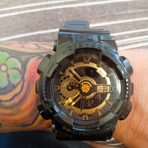 Casio G-Shock GA-110GB black and gold watch like new