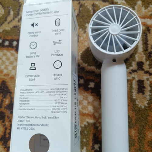 Handheld fan rechargeable with stand and USB cable, white