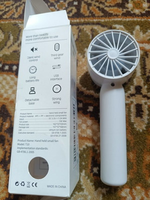 Handheld fan rechargeable with stand and USB cable, white