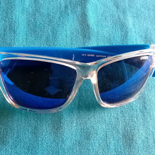 Uvex Kids Sunglasses polarized with blue arms and clear frame like new