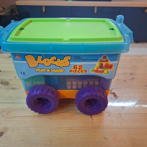 Educational building blocks set with 62 colorful pieces in wheeled box
