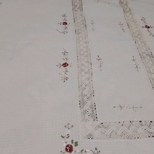 Embroidered tablecloth like new with satin ribbon and floral motifs