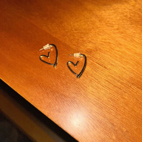 Heart-shaped earrings used, gold color