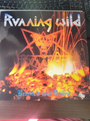 Running Wild Branded and Exiled LP first press 1985 like new, metal