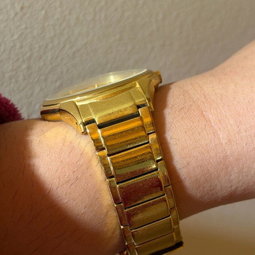 Vogue watch used, gold color with scratches