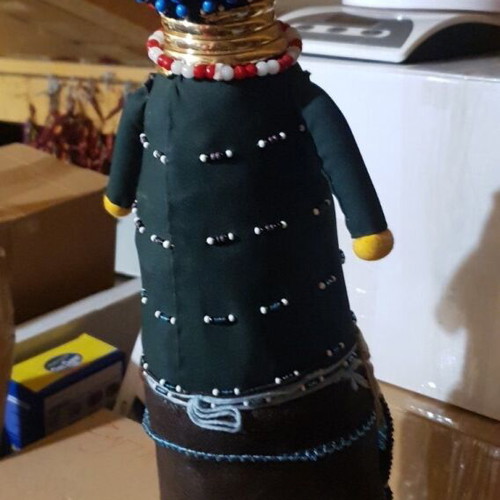 Handmade doll like new, unique with beads