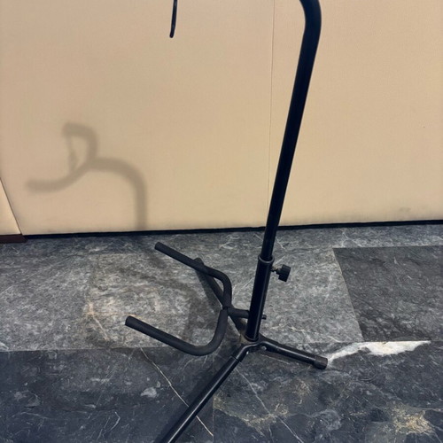 Music stand, guitar floor stand and guitar footrest used