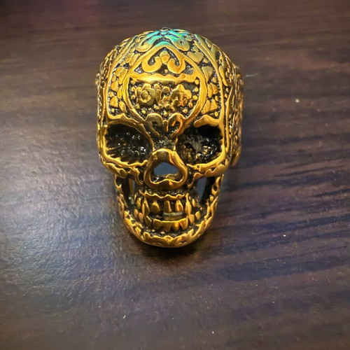 Skull ring steel gold black in excellent condition