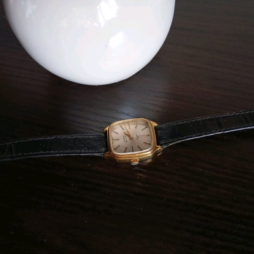 Venus women's watch like new with black leather strap and gold details