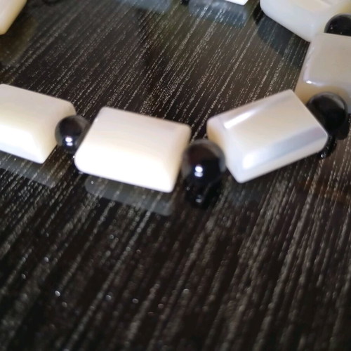 Bracelet with semi-precious stones like new, black and white