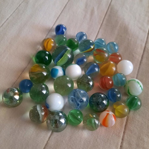 Marbles like new, set of 38, assorted colors and sizes