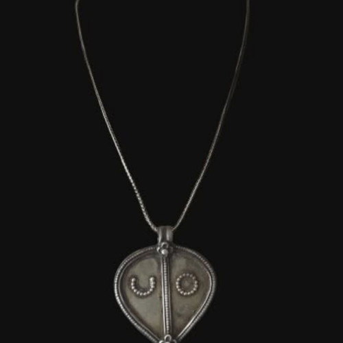 Vintage necklace with 925 silver chain and large ethnic pendant used