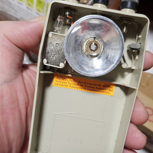 Vintage DDR electrical tool shaped like a flashlight used