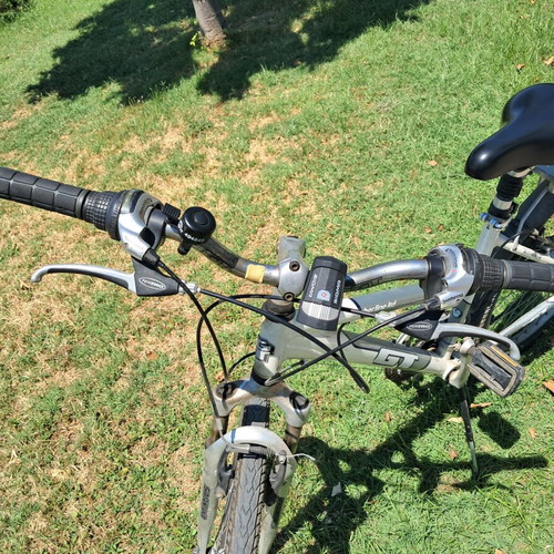 ZZK and GT Timberline Ltd trekking bicycles, silver, with gears