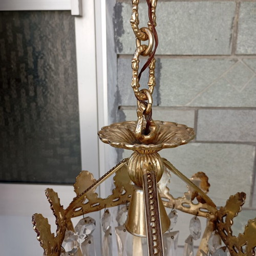 Vintage ceiling light used with brass details