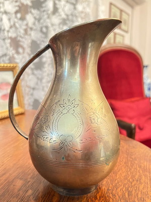 Vintage metal pitcher with handmade engraving like new