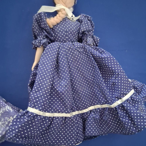 Vintage Slavic doll with porcelain head and fabric body