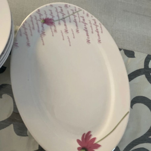 Dinnerware set like new, 6 large, 5 deep, 6 small plates and a platter