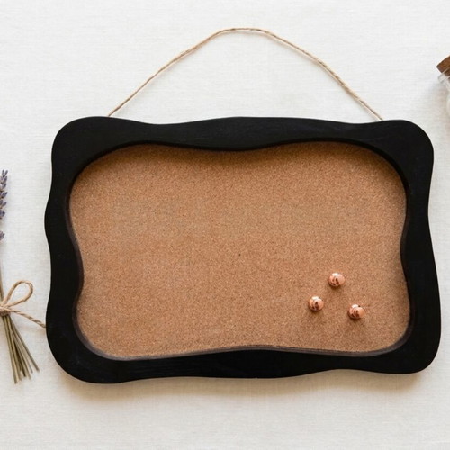 Retro cork board with wavy black wooden frame
