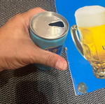 Lowenbrau tin sign and beer can used, 1980s