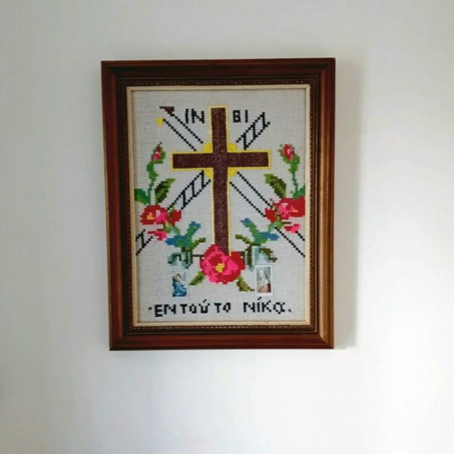 Hand-embroidered cross with wooden brown frame, like new