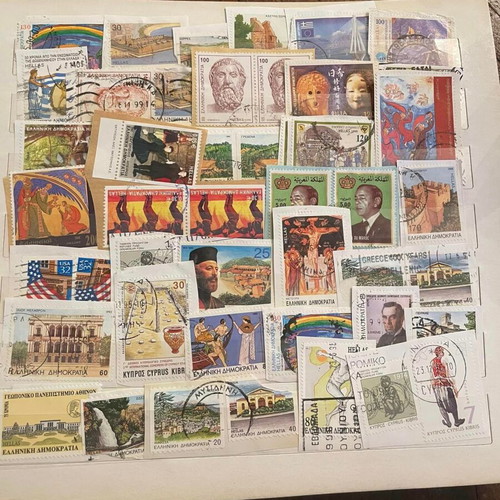 Stamp collection used with album, over 500 pieces
