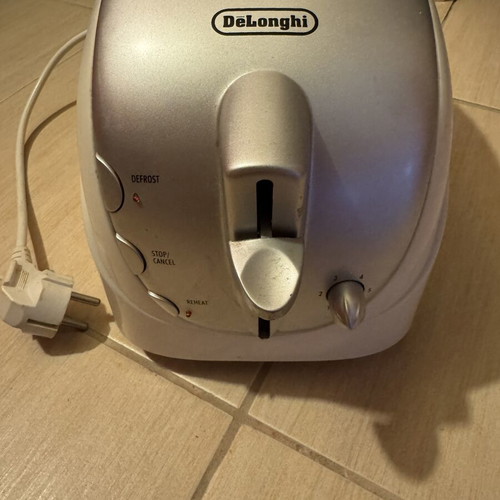 DeLonghi toaster CKT 2003, double slot, 850W, adjustable browning, defrost cancel reheat
