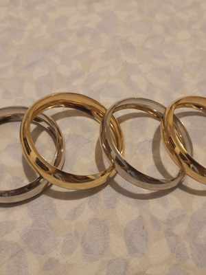 Bracelets gold and silver set of 2 each like new