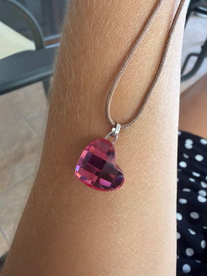 Swarovski pendant with brown leather strap like new, pink