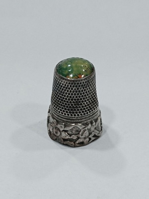 Victorian silver thimble used with green glass top