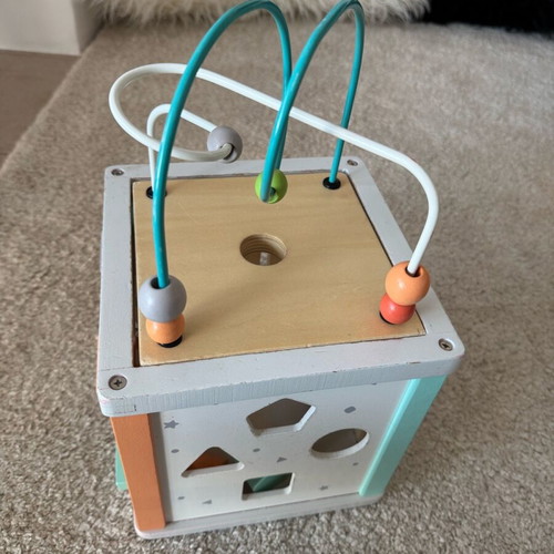 Gerardo's wooden activity cube used